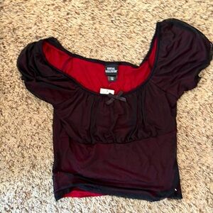 Brand new from “Spencer’s” mesh vampire aesthetic top